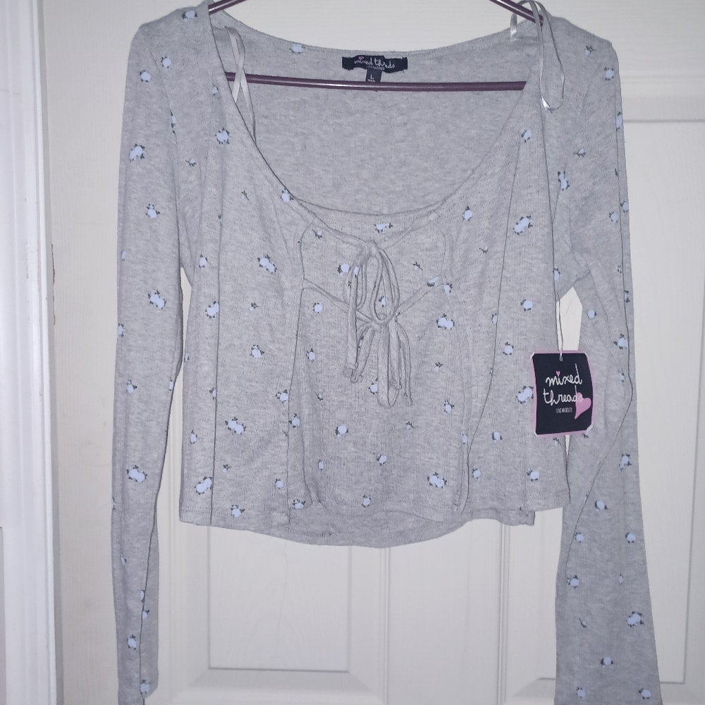 A large mixed threads gray shirt with blue flowers